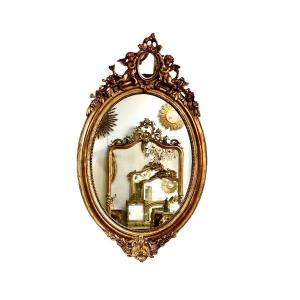 Oval Antique Giltwood Mirror With Cherubs