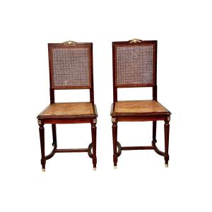 19th Century Pair Of Louis XVI Style French Mahogany And Caned Side Chairs