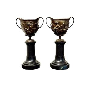 Pair Of 19th Century French Bronze Urns On Marble Pedestals