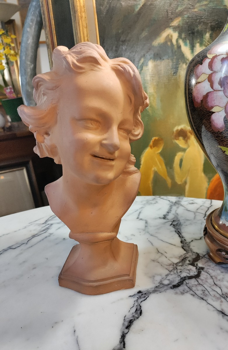 Terracotta Bust Of A Laughing Child  1930