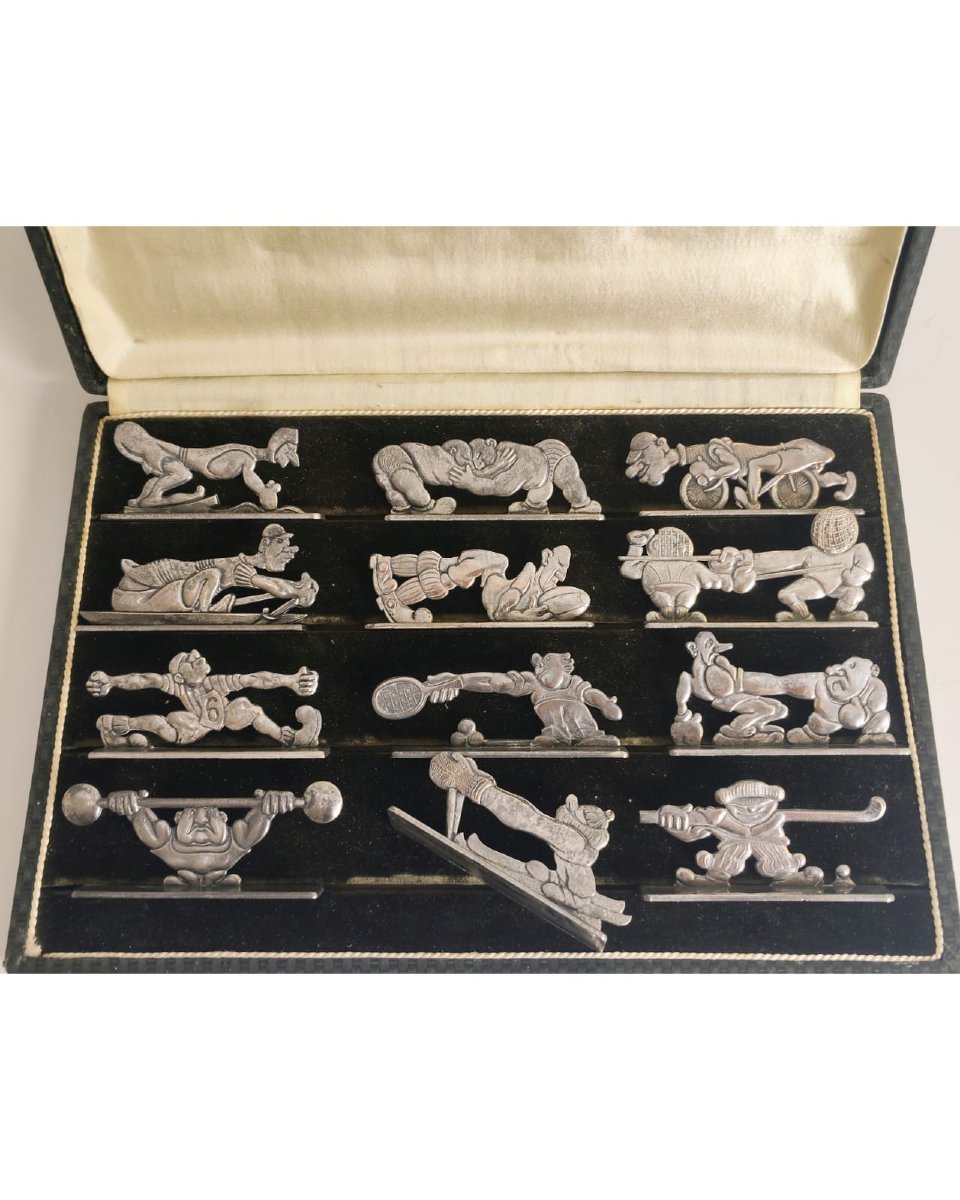 12 porte couteaux art deco , theme - le sport 
