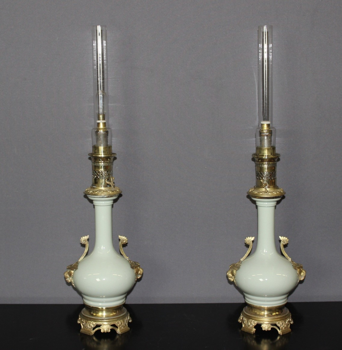 Pair Of Porcelain And Bronze Oil Lamps From The Late 19th Century