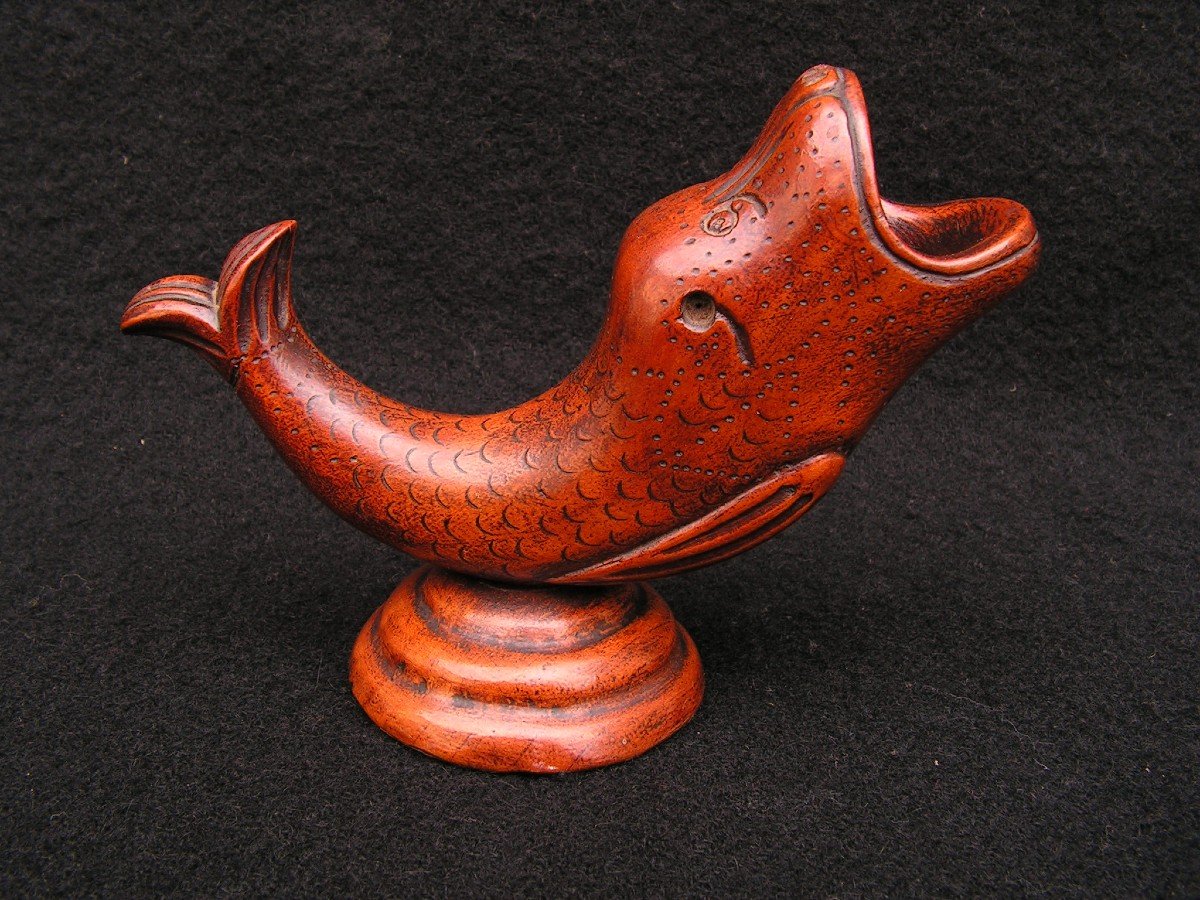 Old Carved Wooden Pyrogen Representing A Dolphin.-photo-3