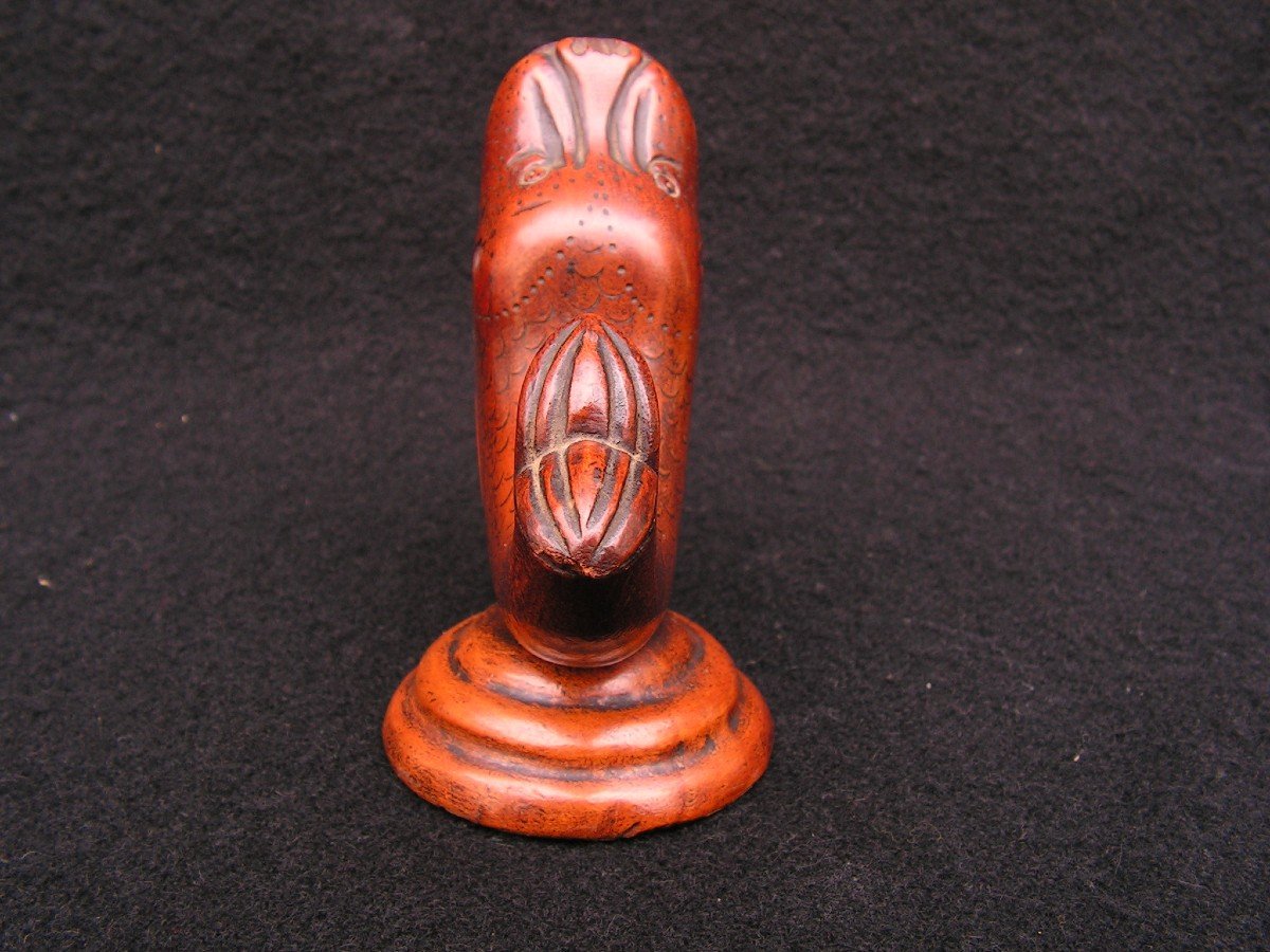 Old Carved Wooden Pyrogen Representing A Dolphin.-photo-4