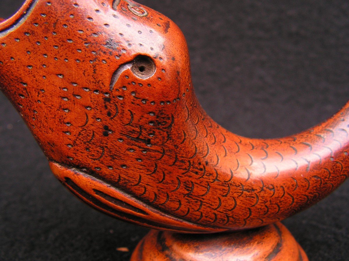 Old Carved Wooden Pyrogen Representing A Dolphin.-photo-4