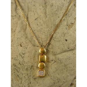 Articulated Pendant And Its Chain In Yellow Gold And Diamonds