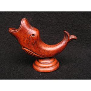 Old Carved Wooden Pyrogen Representing A Dolphin.