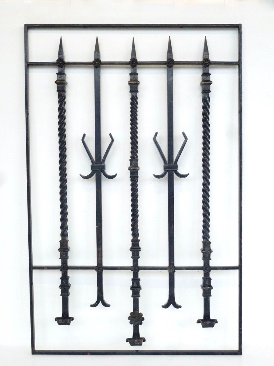 Grille de défense de porte vitrée en fer forgé