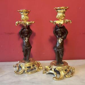 Paire de bougeoirs aux putti, époque Napoléon III