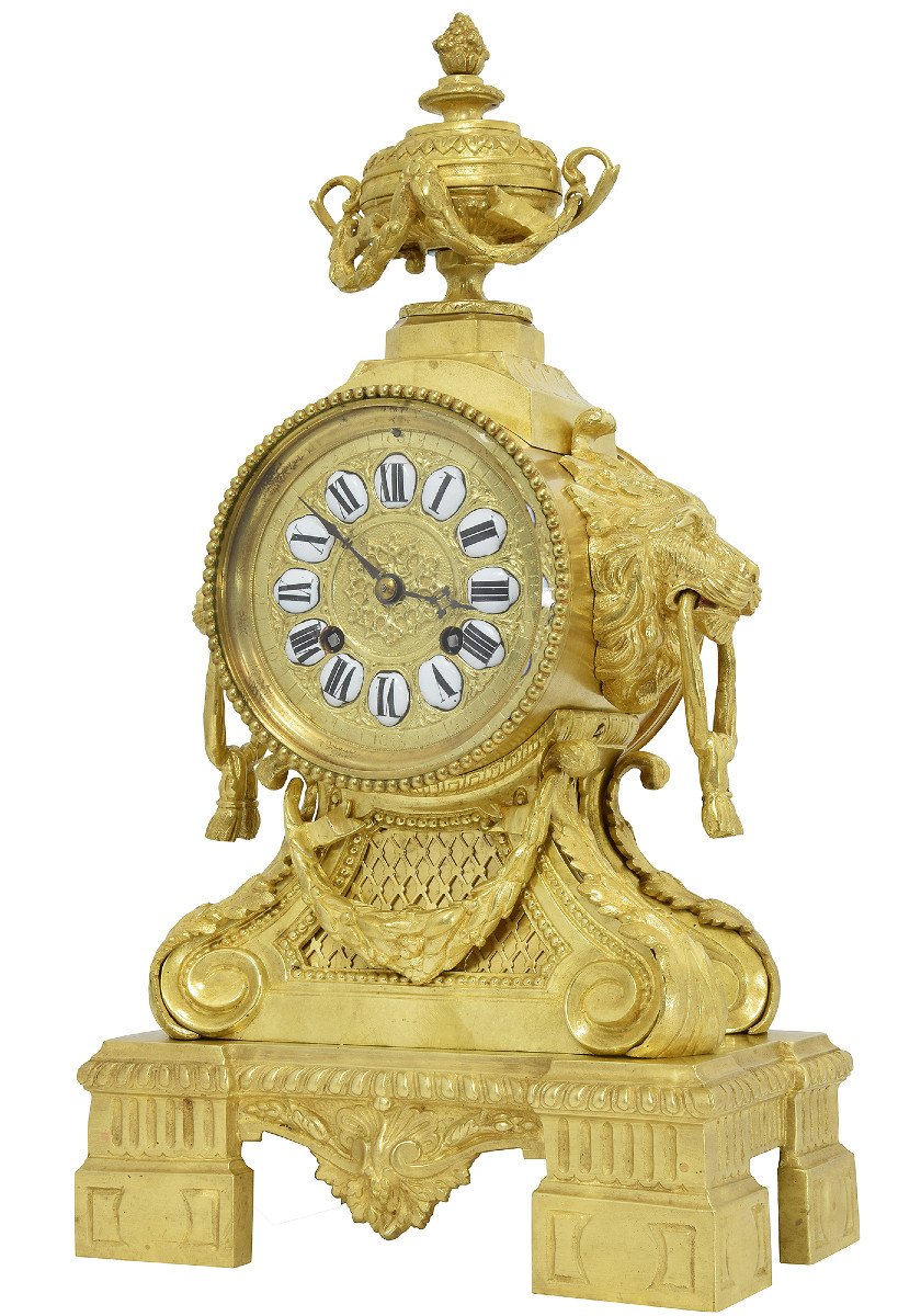 Pendule bronze doré "Mufles de lion" Néo-classique XIXème