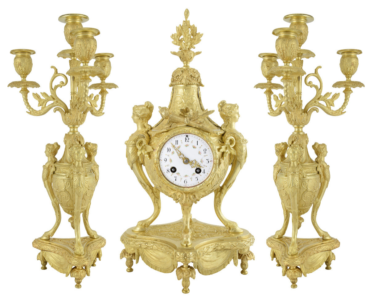 Pendule et chandeliers "cariatide" Horloger: Mougin