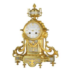 Pendule bronze doré et onyx Horloger :  BOZZO 1860