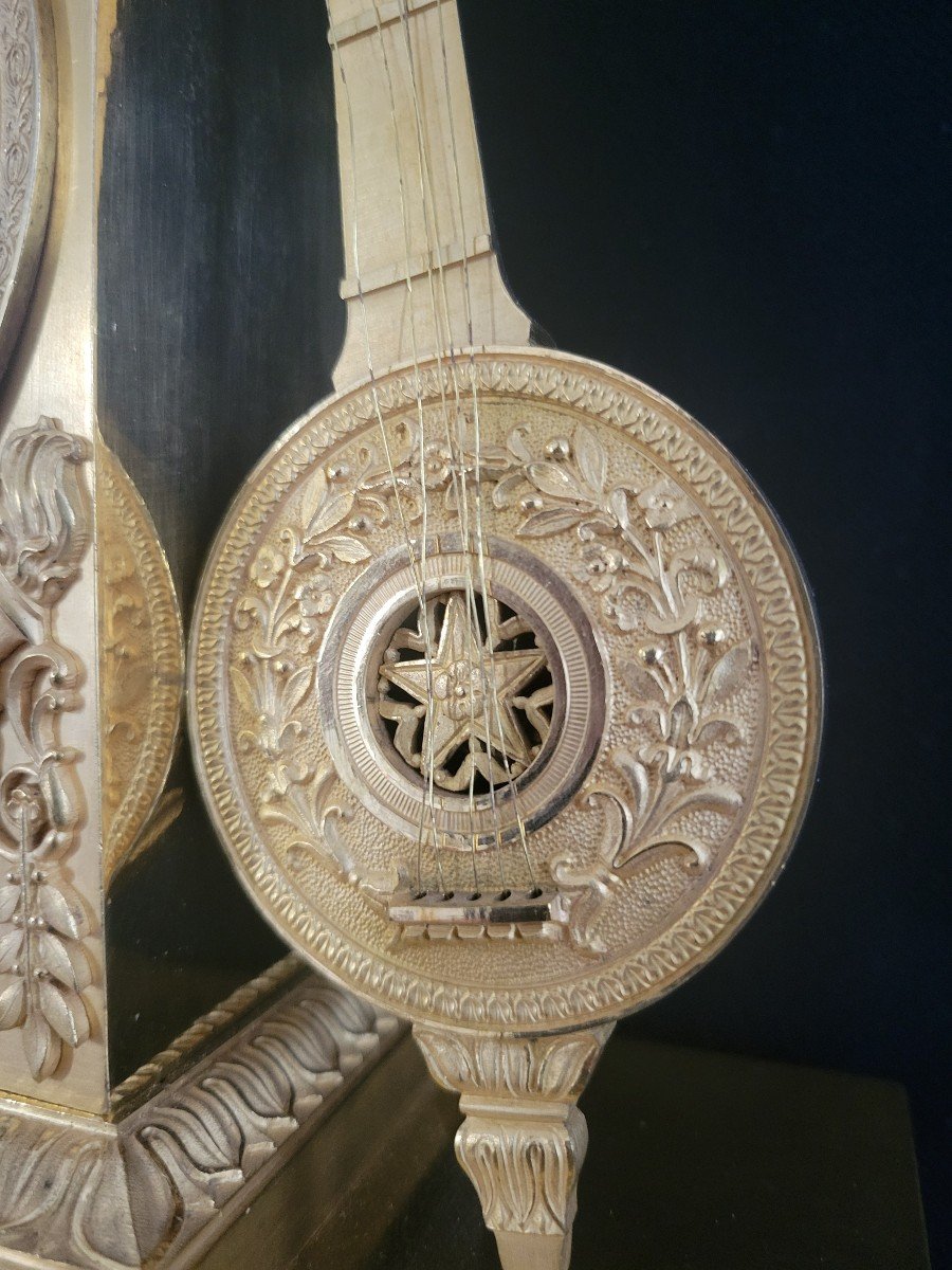 Pendule Empire en bronze doré par les bronziers  Denière et Matelin  Figurant Apollon -photo-2