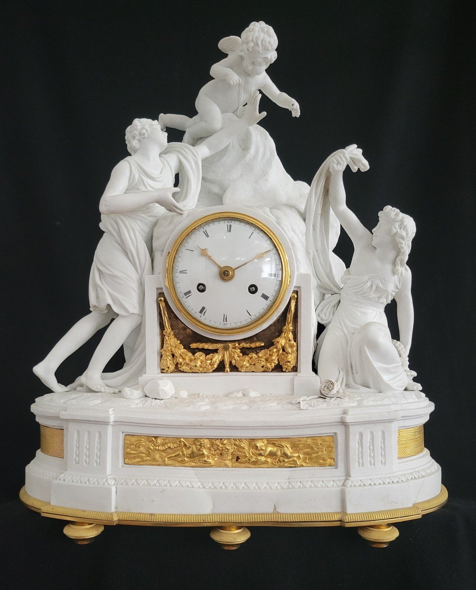 Pendule XVIII d'époque Lous XVI en biscuit et bronze doré