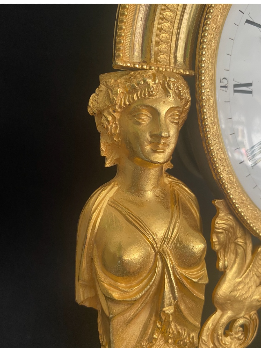 Pendule aux caryatides en bronze doré époque empire-photo-4