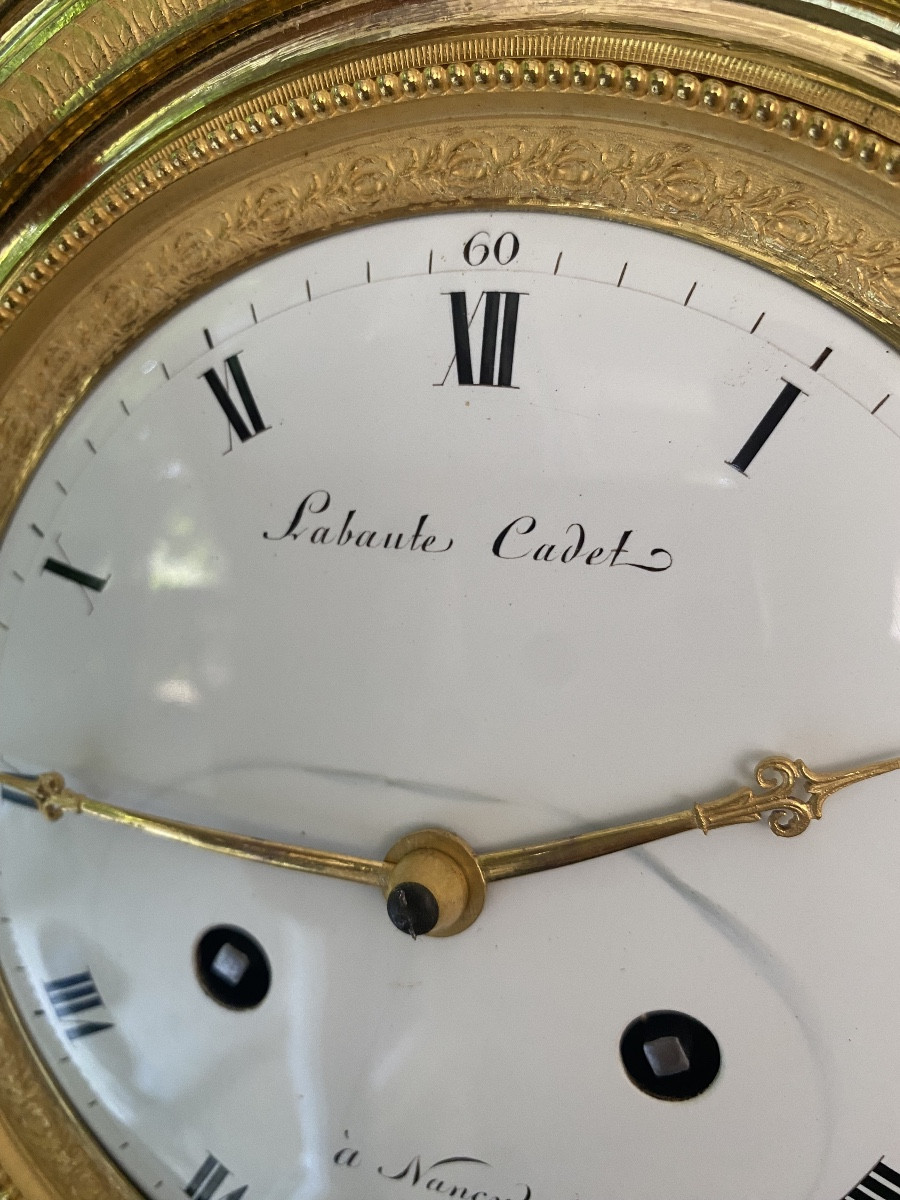 Pendule aux caryatides en bronze doré époque empire-photo-2