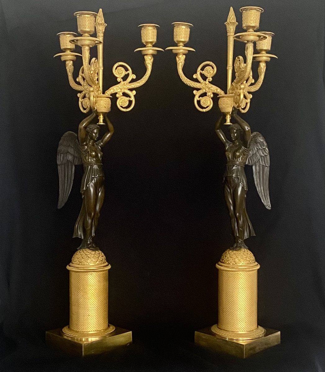 Paire de candélabres en bronze doré et patiné fin de l'époque empire