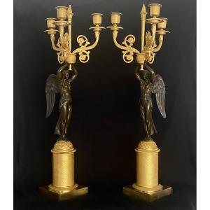 Paire de candélabres en bronze doré et patiné fin de l'époque empire