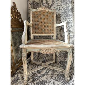 Fauteuil canné de style Régence /Louis XV