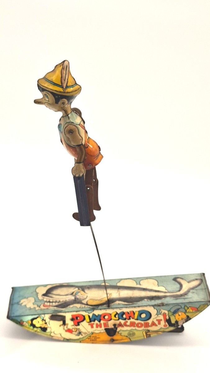 Pinocchio  acrobate  mécanique en  tôle Disney 1939 