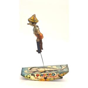 Pinocchio  acrobate  mécanique en  tôle Disney 1939 