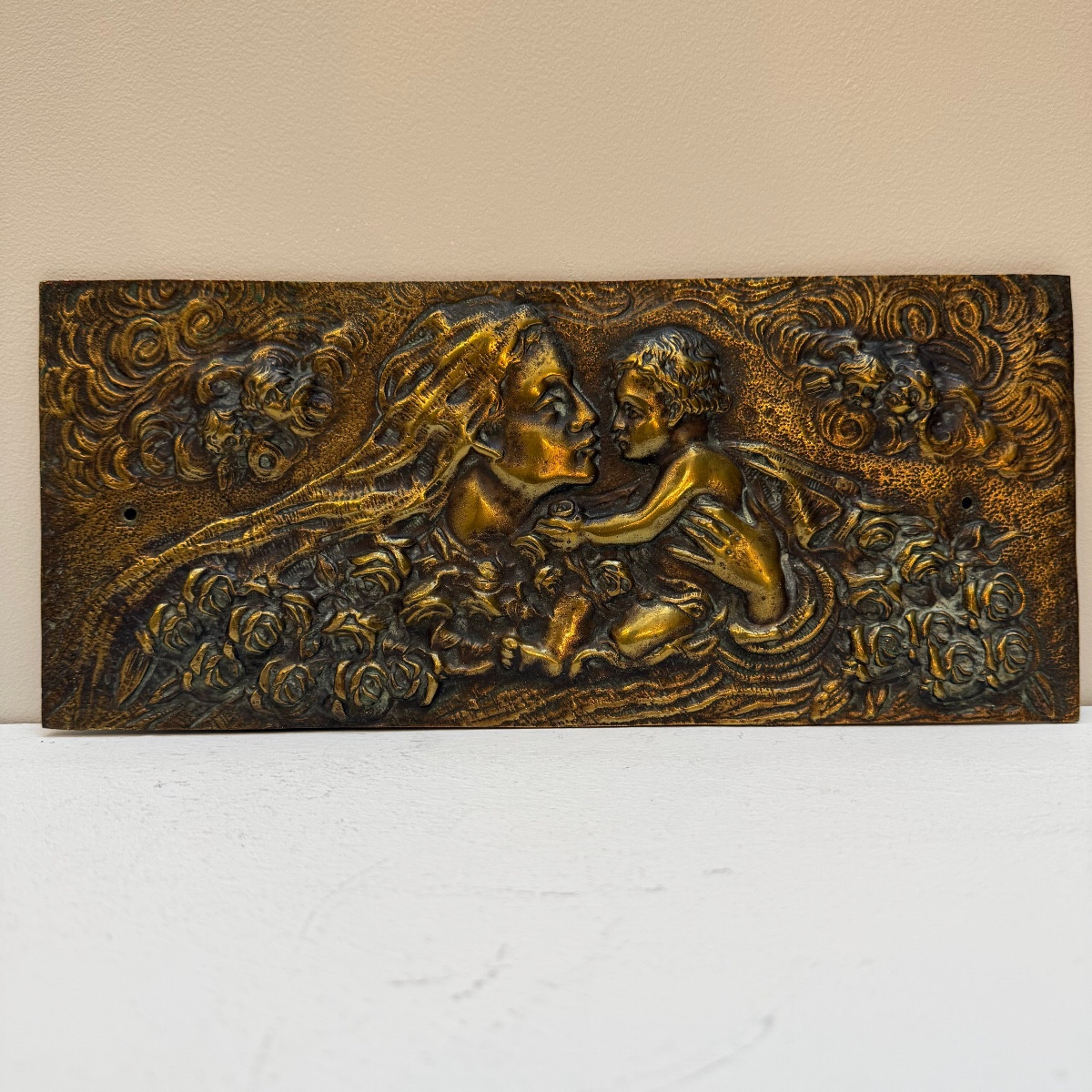 Plaque en bronze , la maternité.
