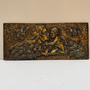 Plaque en bronze , la maternité.