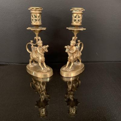 Pair Of Candlestick Gilt Bronze Children Riding A Winged Dog XIX Eme Century.