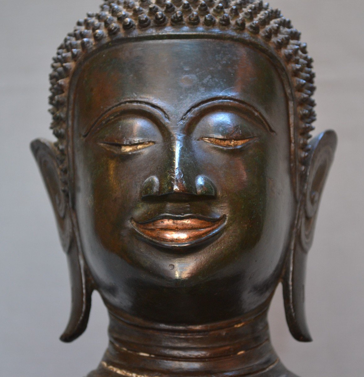 Cast Bronze Buddha Bust Inlaid With Gold.