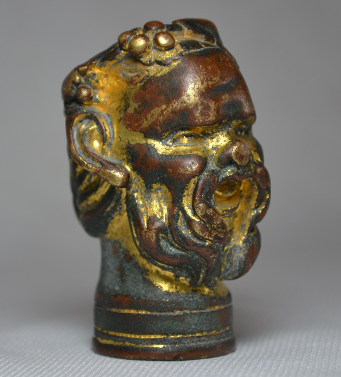 Tête de Bacchus en bronze doré,pommeau de canne renaissance Italienne,16°siècle.