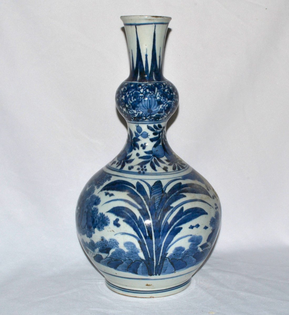 Vase en porcelaine. Décor en bleu de cobalt. Japon 17° siècle. -photo-3