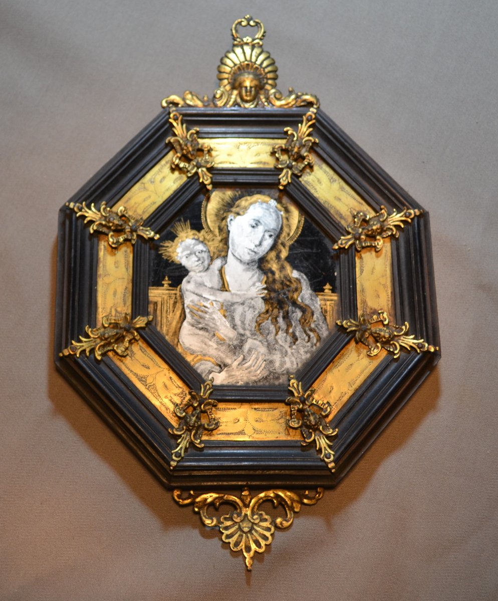 Portraits de Marie et Jésus, verre églomisé (fixé).Cadre bois et bronze doré.17° siècle.