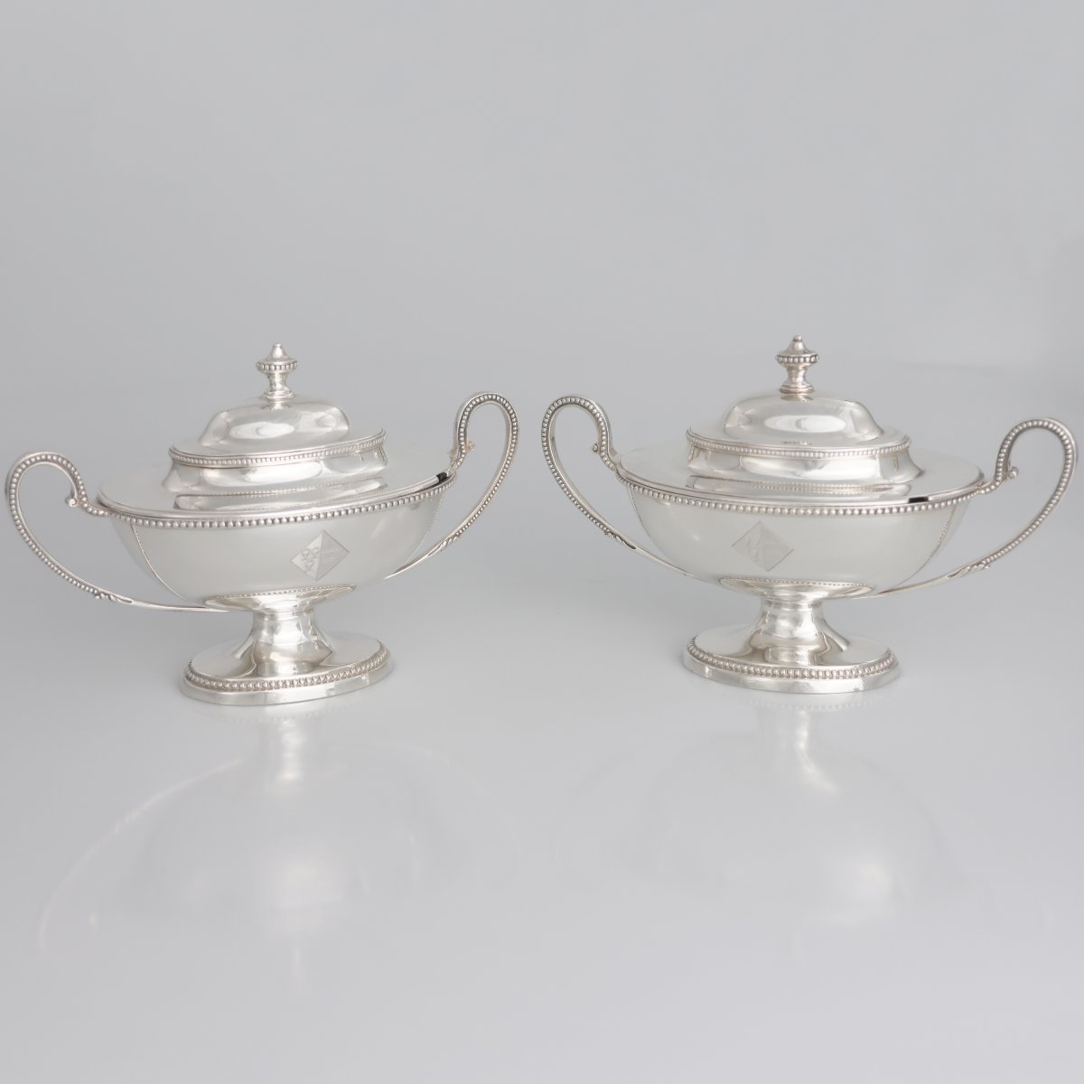 A Pair Of George III Sterling Silver Sugar Bowls And Covers, Thomas Chawner, London, 1783