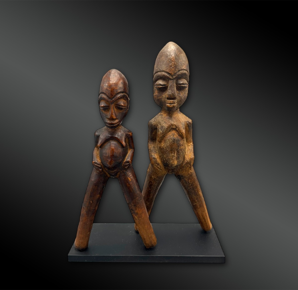 Deux LANCE-PIERRES Culture Lobi, Burkina Faso Première moitié du XXème siècle Bois 72 Deux LANC