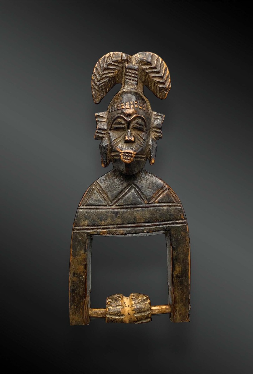 Pulley Stirrup Of A Weaving Loom Animated With A Kpeliyé'e Face Mask, Senufo Culture