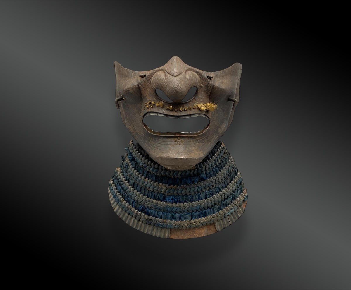 Facial Protection Called Mempo, Entirely Incised. Japan, Momoyama Period, 17th Century.