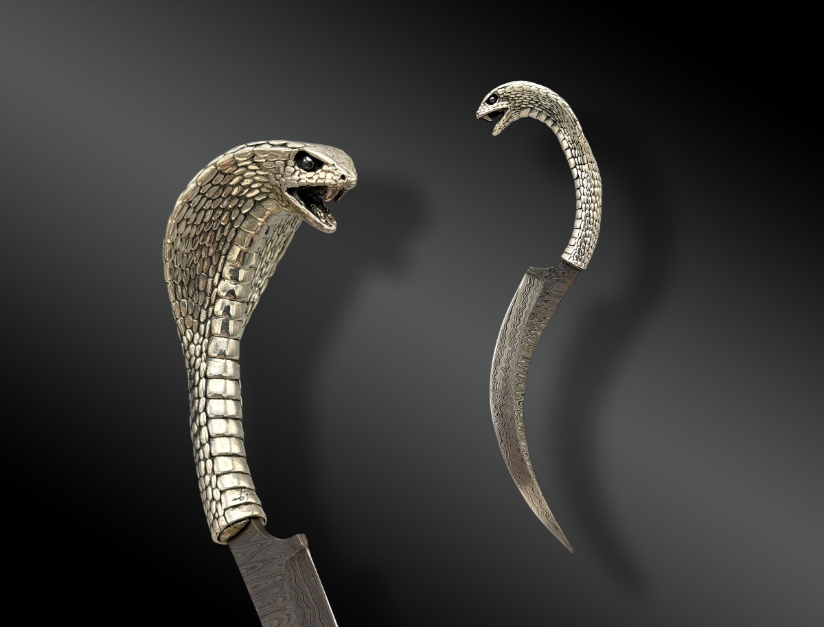 COUTEAU À TÊTE DE COBRA par Jean-Marc LAROCHE