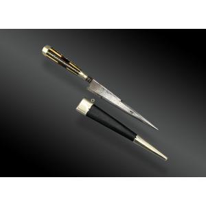 STYLET CORSE, avec poignée à colonnades et son fourreau. France, XIXème siècle 