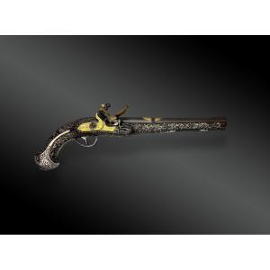 PISTOLET à SILEX, POUR LE MARCHÉ ORIENTAL, ARGENT ET DAMASQUINE D’OR Europe – XVIIIème siècle