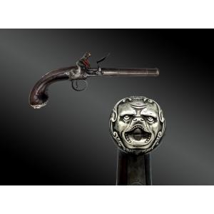 PISTOLET À SILEX, À COFFRE DE TYPE QUEEN ANN, PAR W. GUY - LONDON