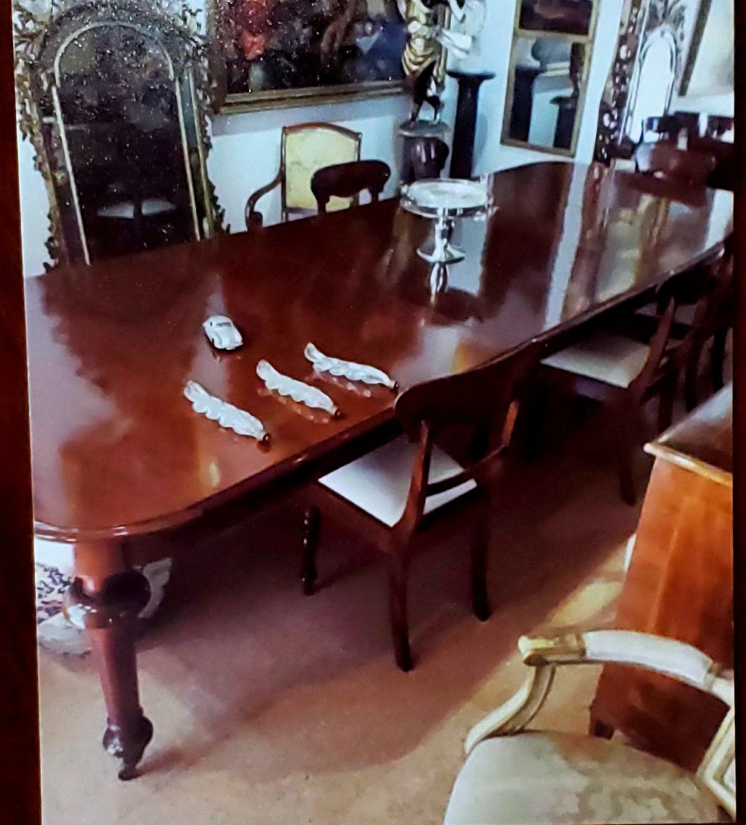 Table anglaise victorienne, en bois d'acajou. Cette table peut être rallongée à volonté
