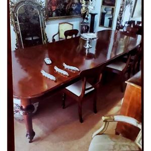 Table anglaise victorienne, en bois d'acajou. Cette table peut être rallongée à volonté