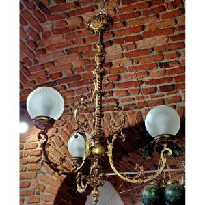 Lustre ancien de style baroque de la seconde moitié du XIXe siècle en bronze dorè