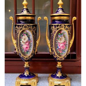 Pair Of Cobalt-blue Porcelain Vases With Gold Relief Decorations And Floral Miniatures