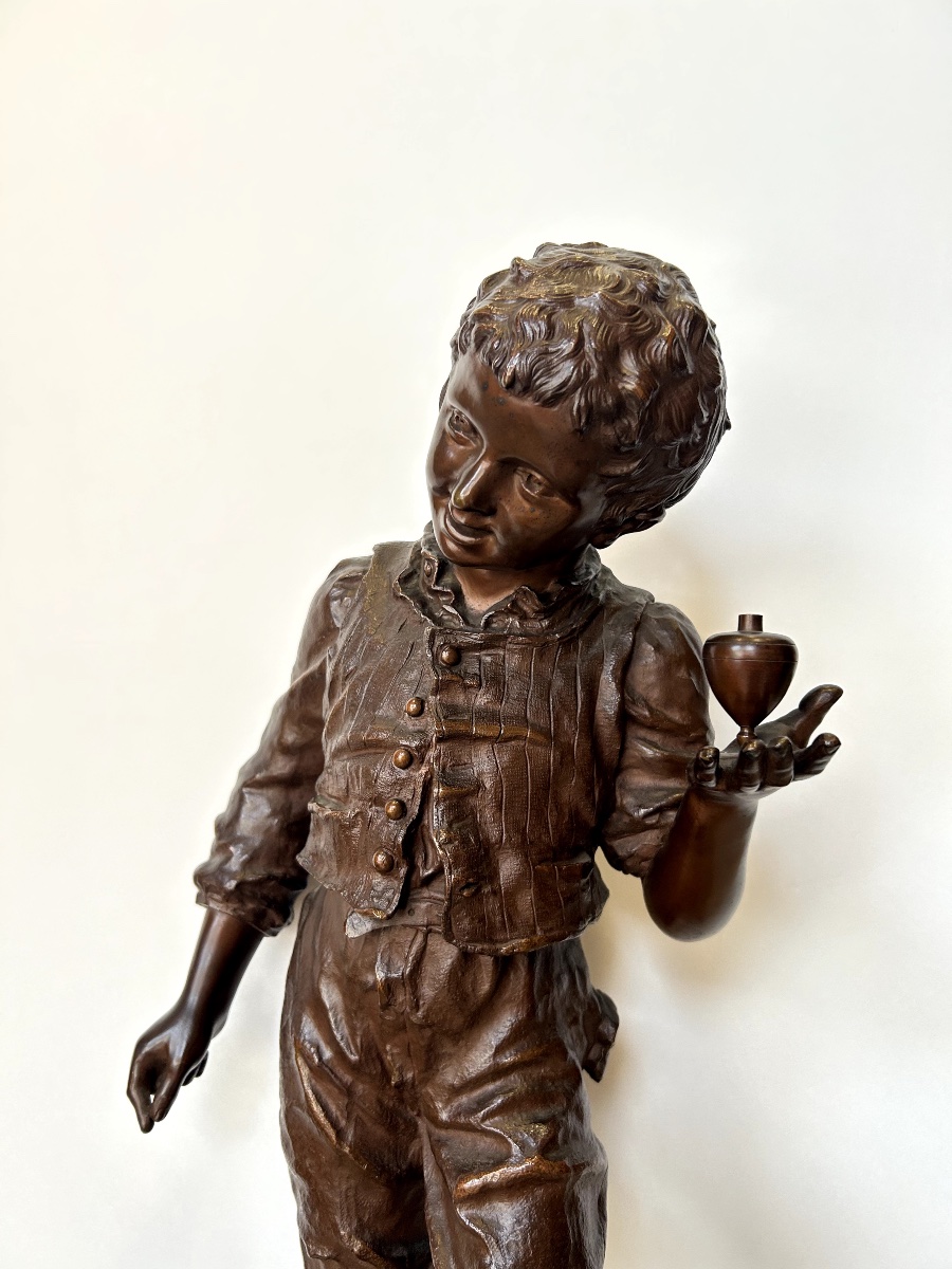 Bronze Statue Of A Boy Playing With A Spinning Top. Sculptor: Charles Anfrie (1833–1905)-photo-1