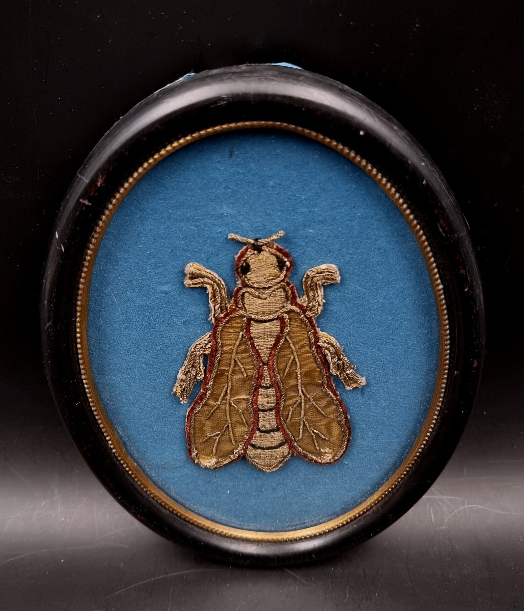 A Bee Embroidered In Gold And Silver Thread On Fabric, A Symbol Of Napoleon, From A Tapestry.