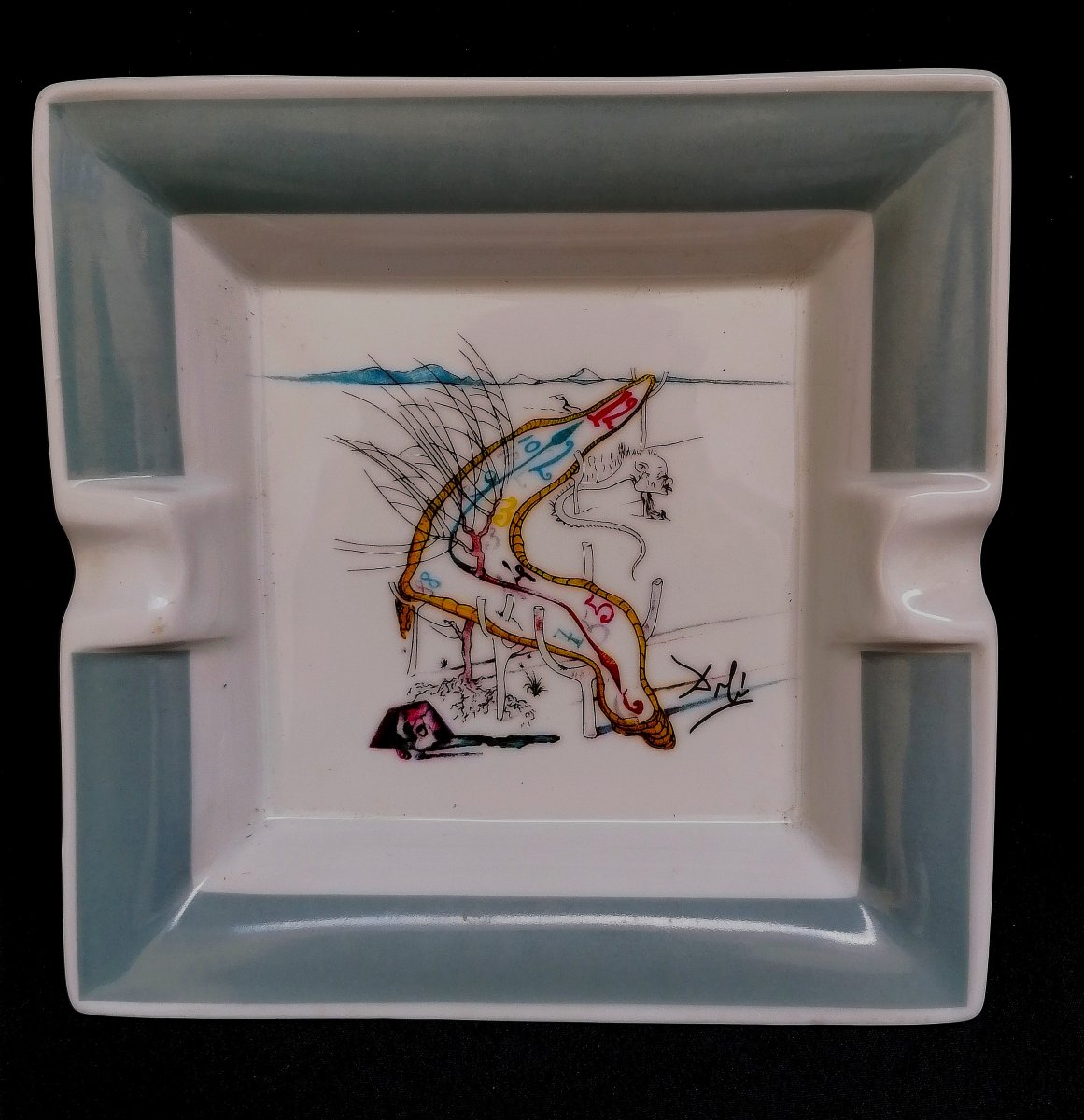 CENDRIER EN PORCELAINE D'APRES SALVATOR DALI - LA CONQUETE DU COSMOS - EDITION LIMITEE -