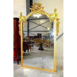 Grand miroir de style Napoleon III en bois doré
