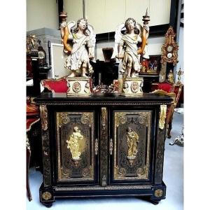 Couple d'anges en bois polychrome