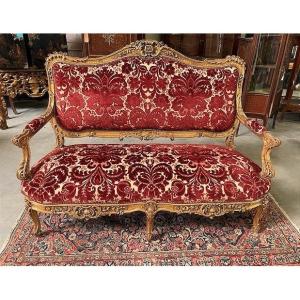 Grand canapé en bois doré